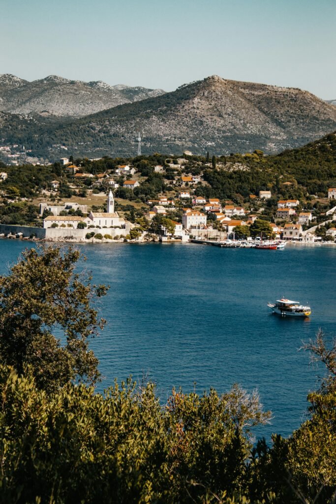 Discover the picturesque coast of Lopud Island, Croatia with its charming village by the Adriatic Sea.